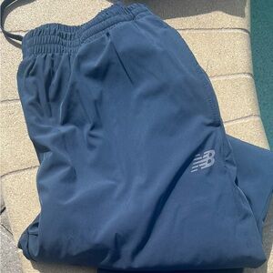 Men’s new balance fleece lined pants, size XL.